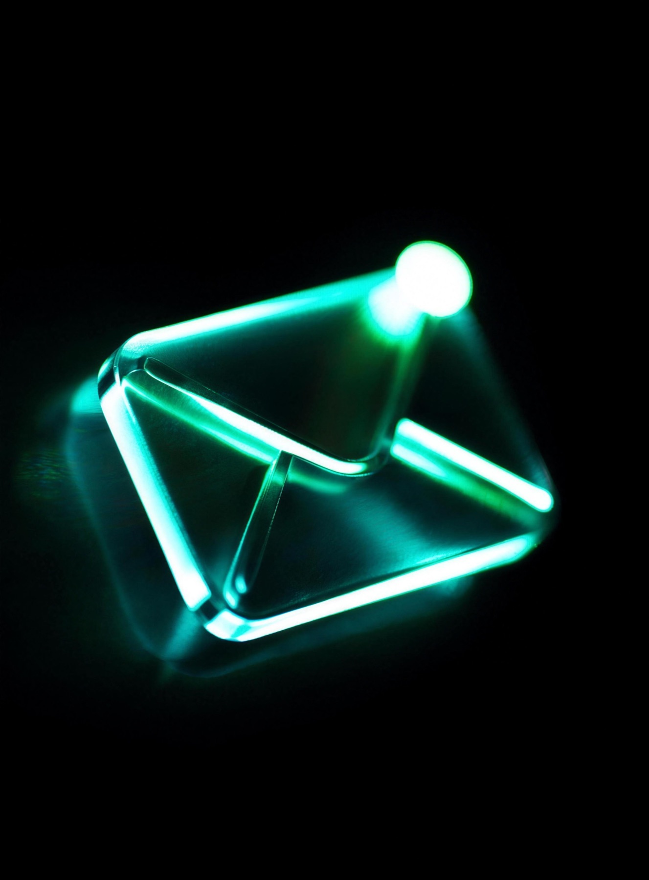 Abstract translucent glass envelope breaking into glowing emerald shards, representing the UAI webmail module